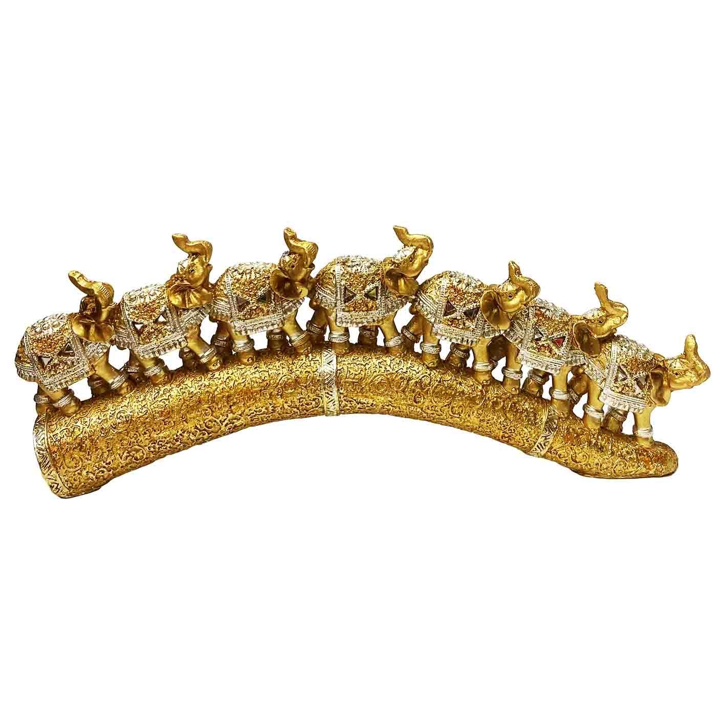 Keramikfiguren "7 Elefanten auf einem Stoßzahn", Gold mit Spiegeln, 30х12 cm